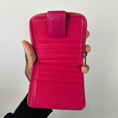 Yves Saint Laurent Pink Cassandra Embossed Round Zip Wallet