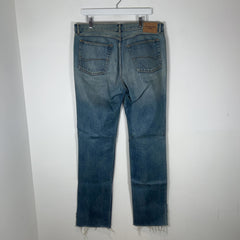 Balenciaga Waxed Distressed Denim Jeans