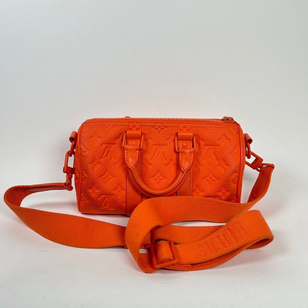 Louis Vuitton Orange Monogram Taurillon Keepall Bandouliere 25 Bag