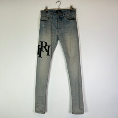 Amiri Lightwash Staggered Logo Denim Jeans