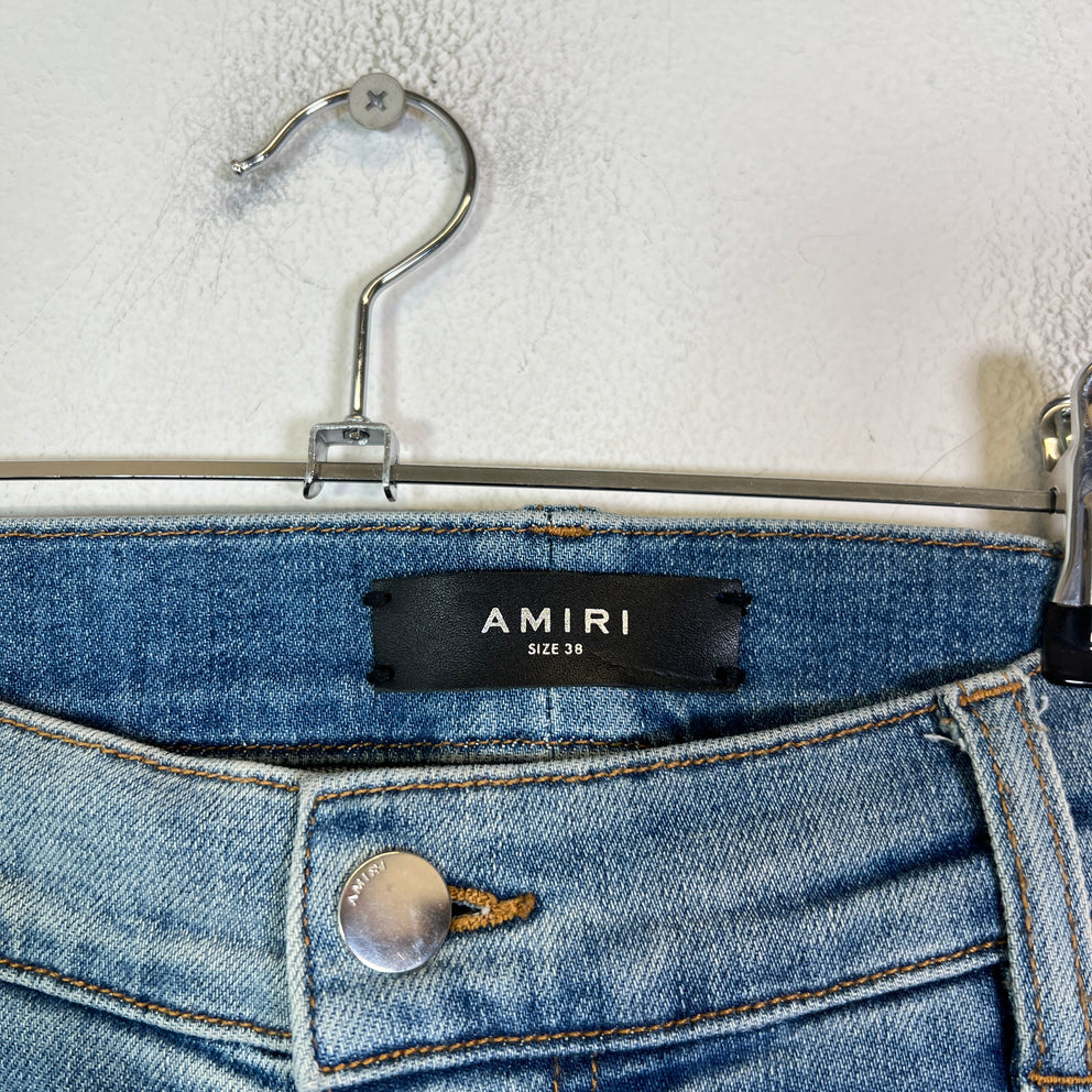 Amiri Lightwash Denim Patch Distressed Jeans