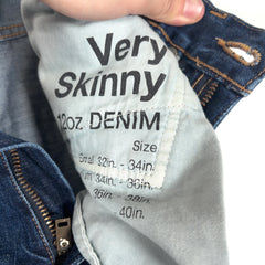 WTAPS High Rise Distressed Jeans