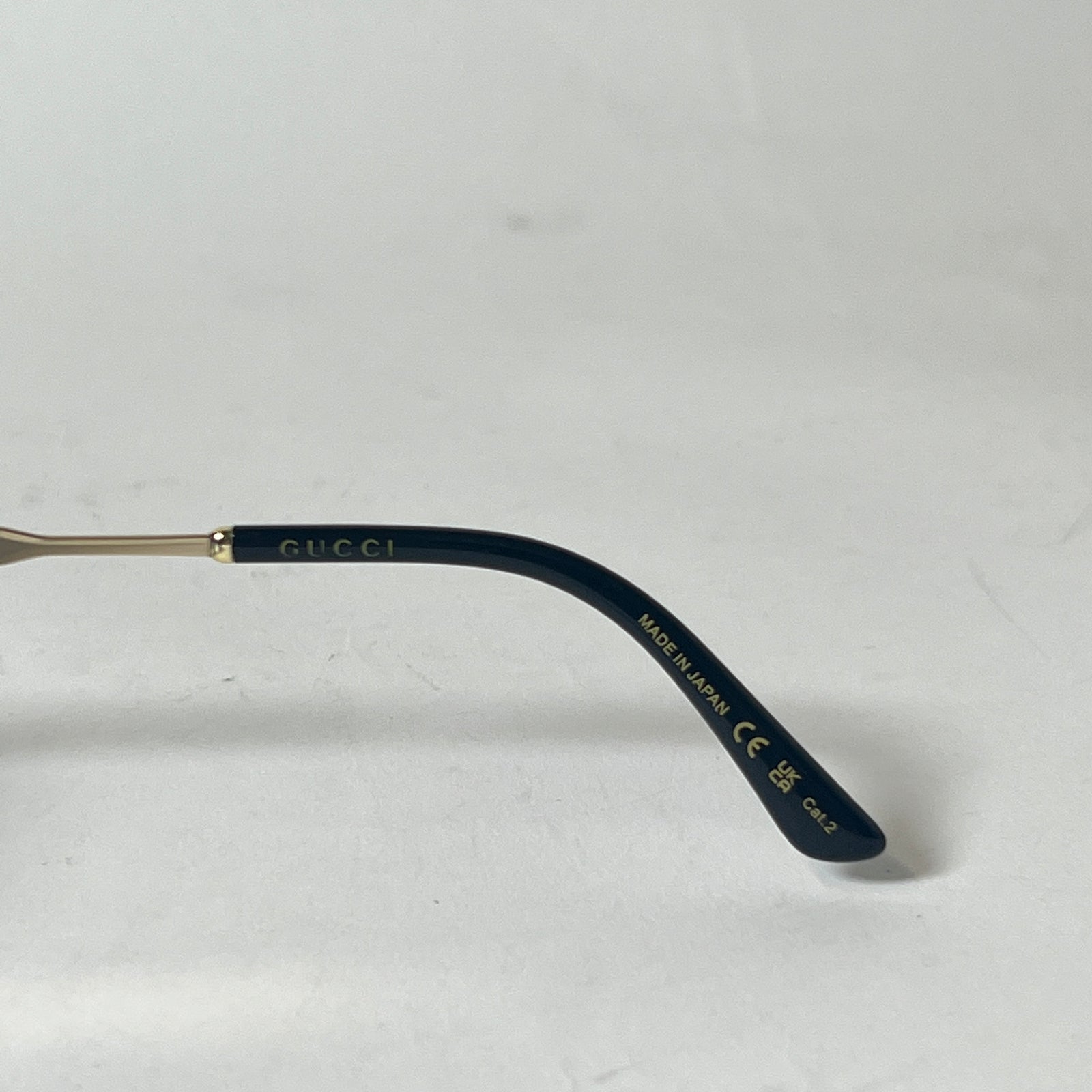 Gucci Gold Cat Eye Sunglasses
