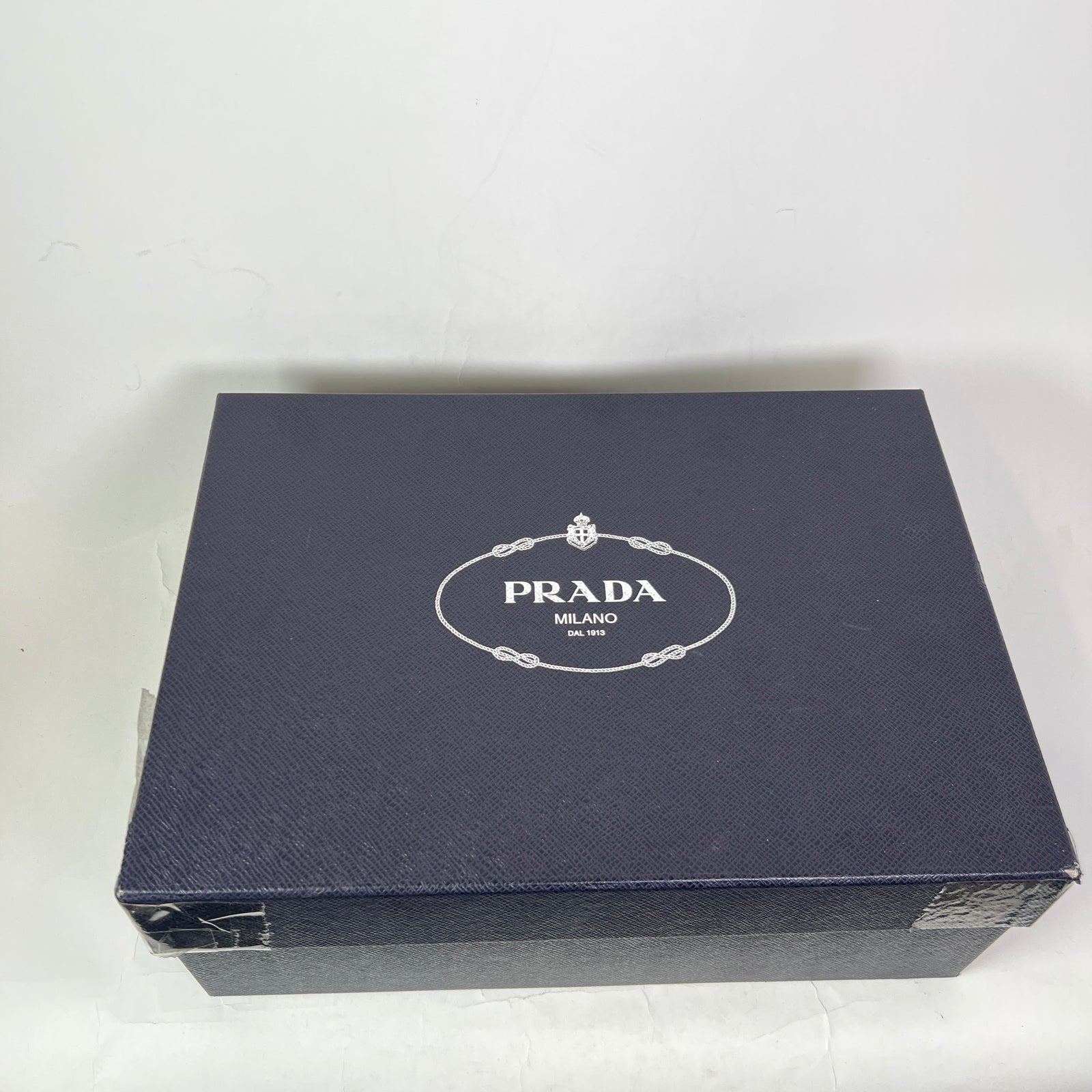Prada Red Chocolate Loafers