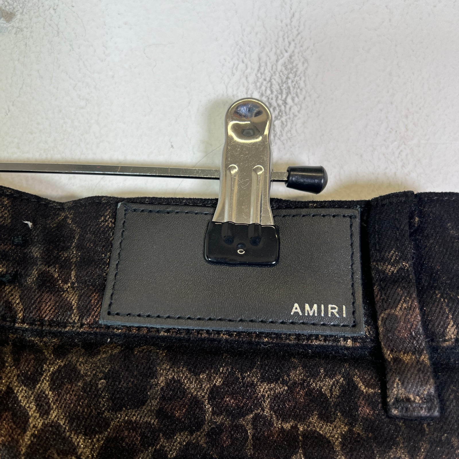 Amiri Broken Leopard Waxed Distressed Jeans