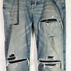 Amiri Light Indigo MX1 Black Patch Denim Jeans