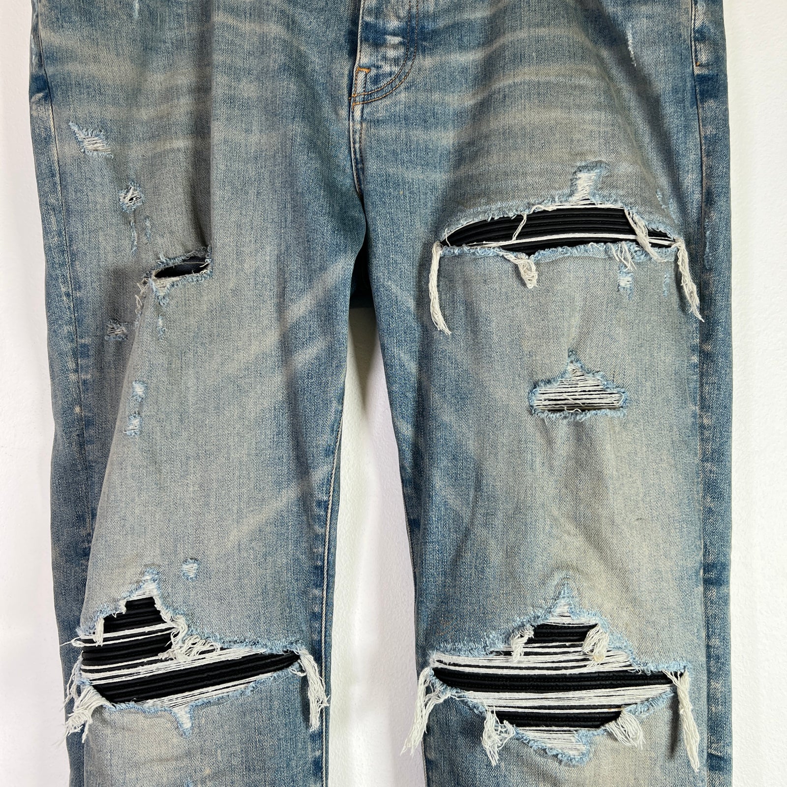 Amiri Light Indigo MX1 Black Patch Denim Jeans