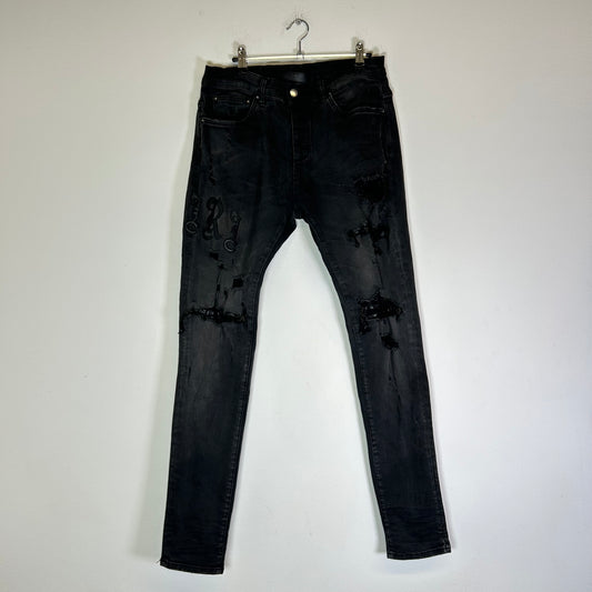 Amiri MX1 Old English Jeans