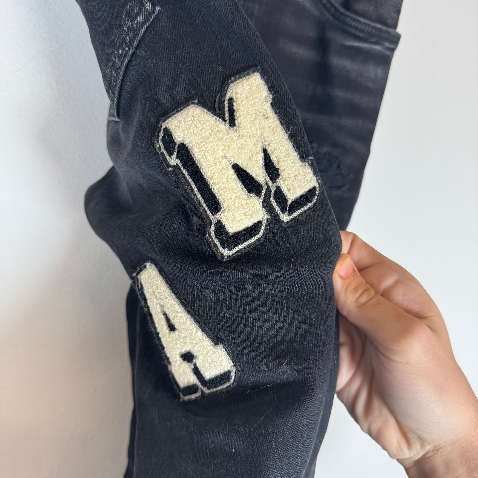Amiri Black Varsity Logo Skinny Jeans Size 29