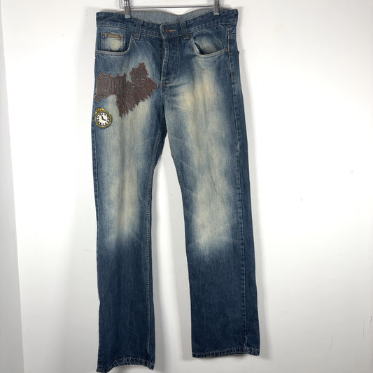 Dolce & Gabbana Faded Out Wash Patched Jeans
