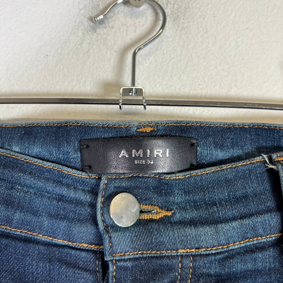 Amiri MX1 Dark Blue Wash Black Patch Denim Jeans