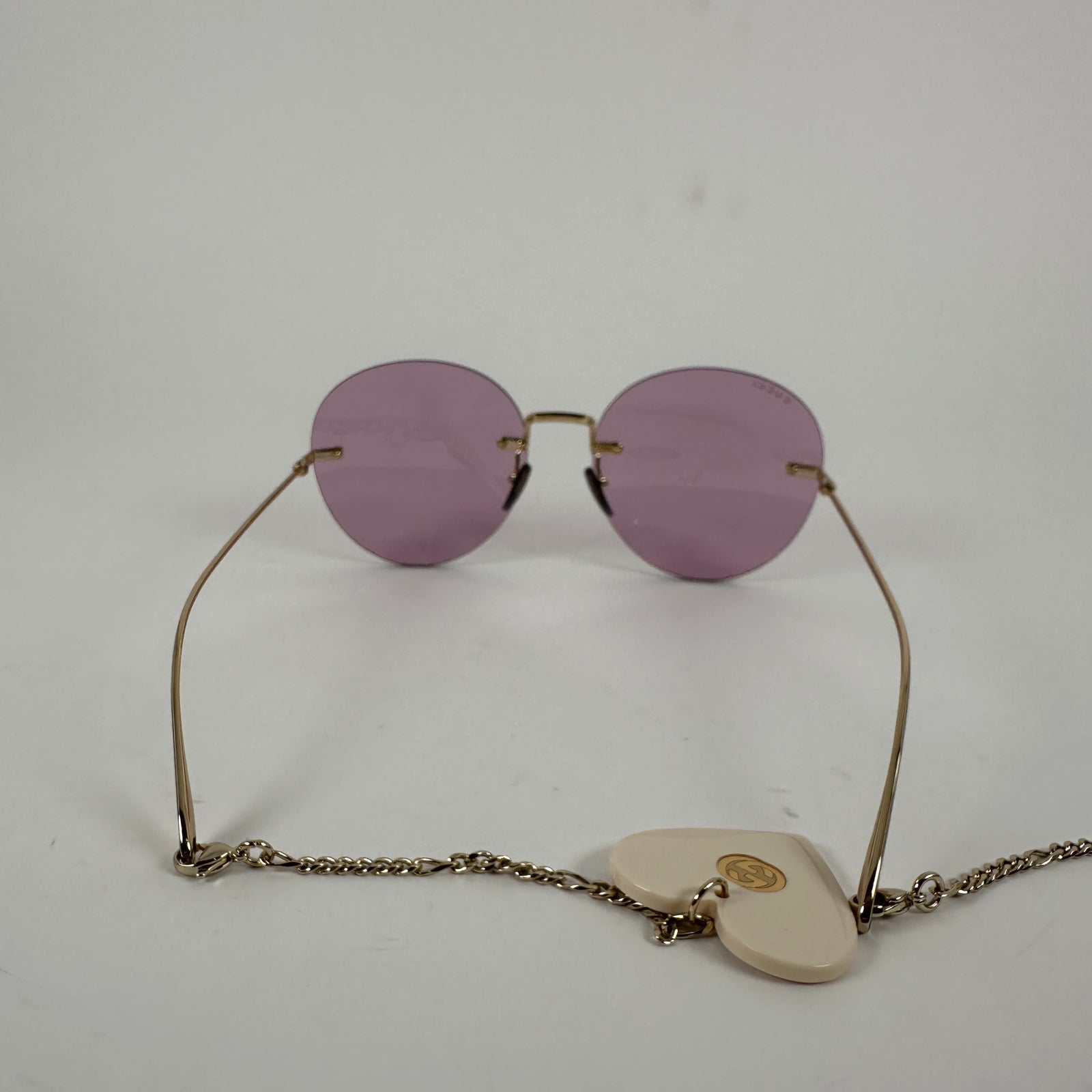 Gucci Purple Circular Rimless Sunglasses