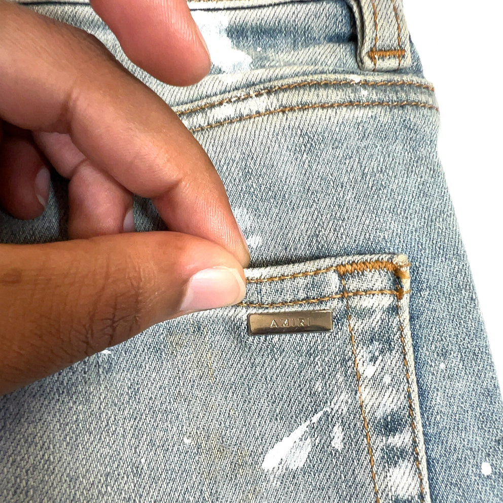 Amiri Distressed Paint Splatter Denim Jeans