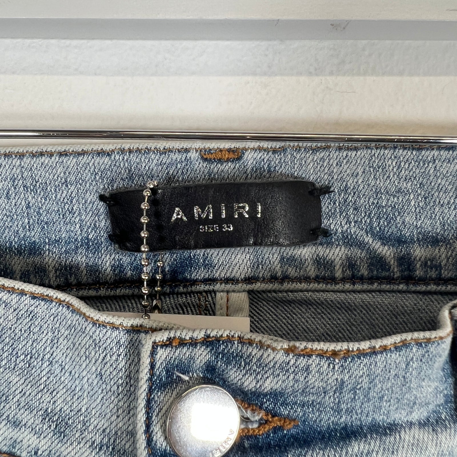 Amiri Lightwash Knee Hole Size 33