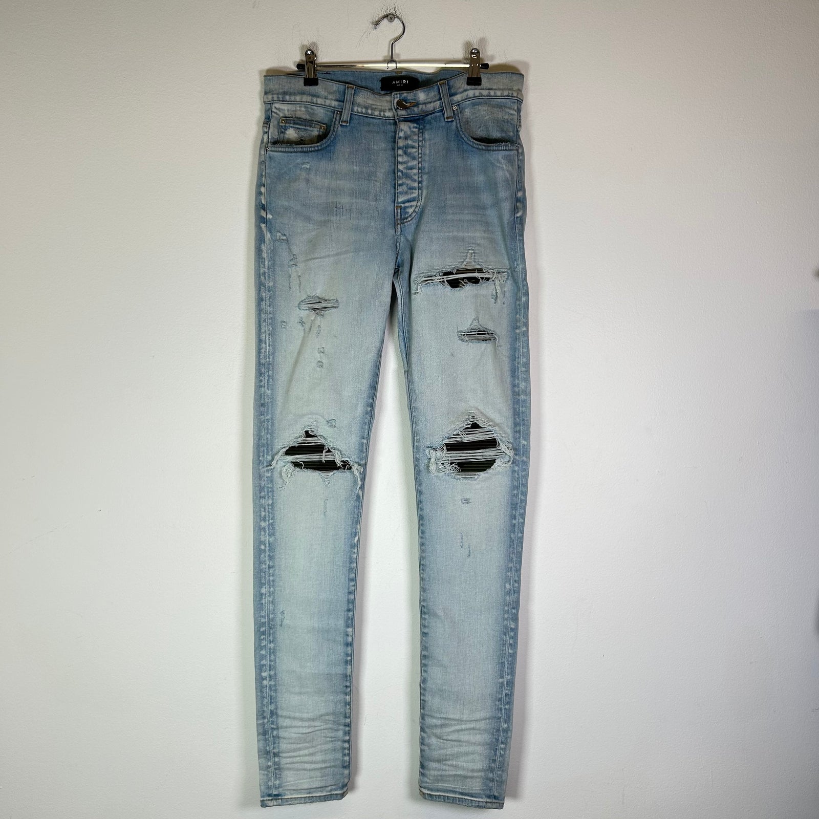 Amiri MX1 Light Indigo Camo Patch Jeans
