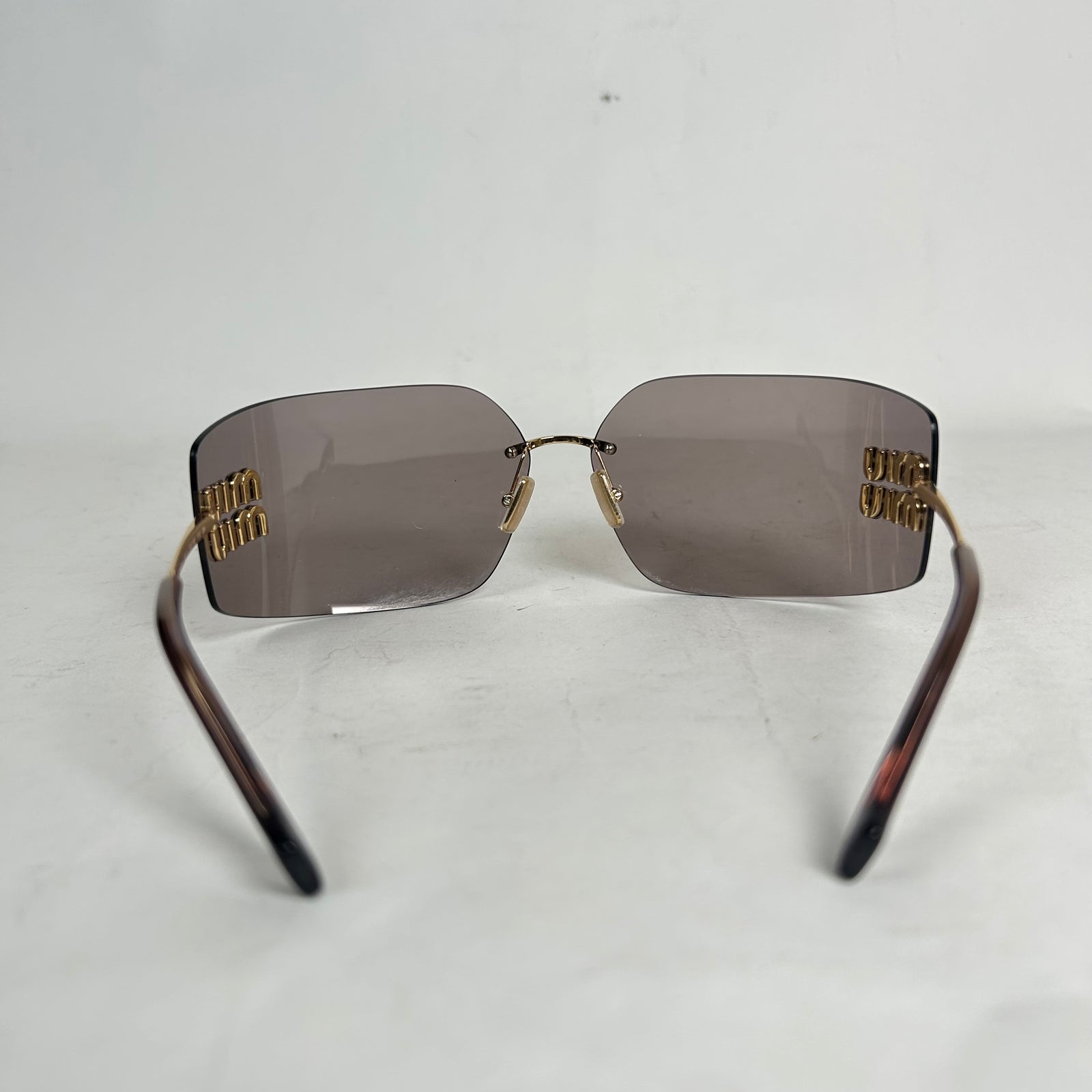 Miu Miu Rose Gold Oversized Rimless Sunglasses