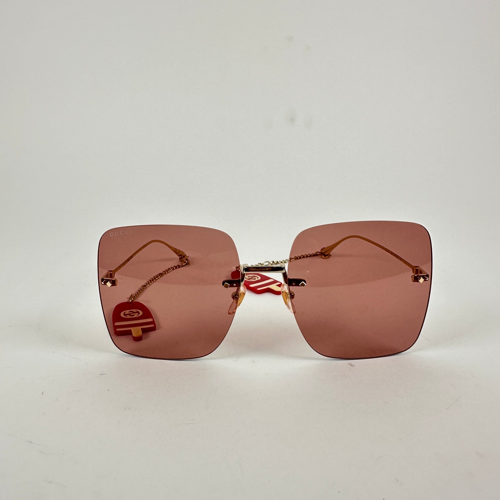 Gucci Pink Square Rimless Sunglasses