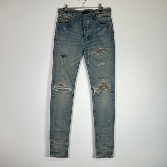 Amiri MX1 Grey Suede Patch Lightwash Jeans
