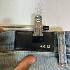 Amiri Lightwash Staggered Logo Denim Jeans