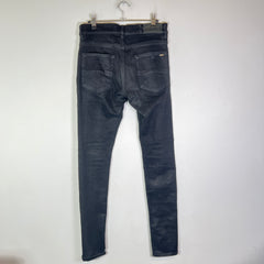 Amiri MX1 Black Waxed Denim Jeans