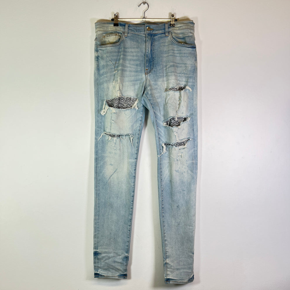 Amiri Lightwash Zebra Patch Distressed Jeans