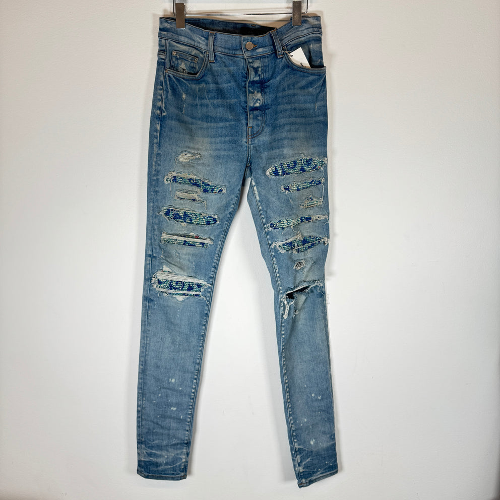 Amiri Lightwash Tie-Dye Patch Thrasher Jeans Size 33