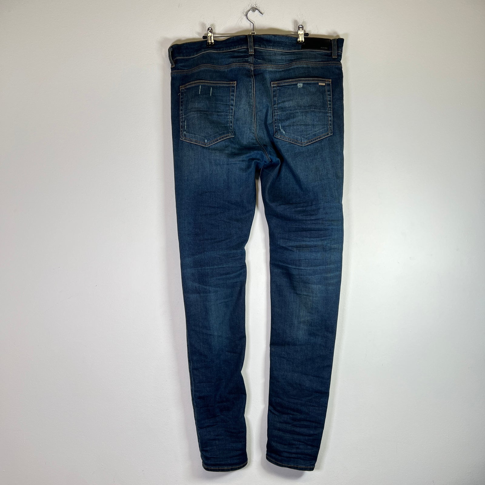 Amiri MX1 Dark Blue Wash Black Patch Denim Jeans