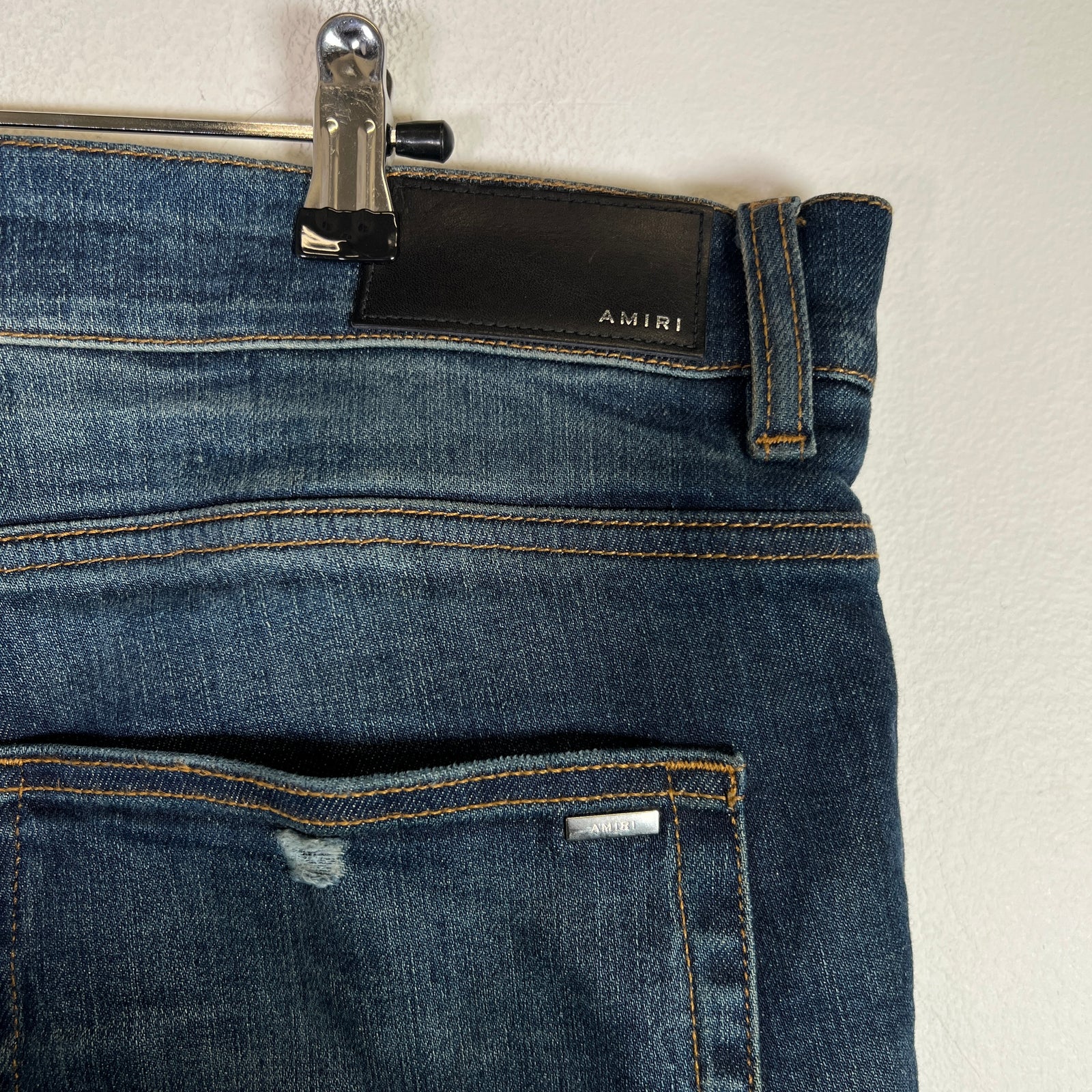 Amiri MX1 Dark Blue Wash Black Patch Denim Jeans