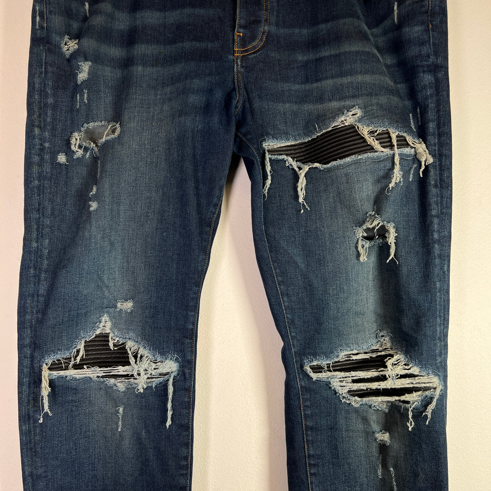 Amiri MX1 Dark Blue Wash Black Patch Denim Jeans
