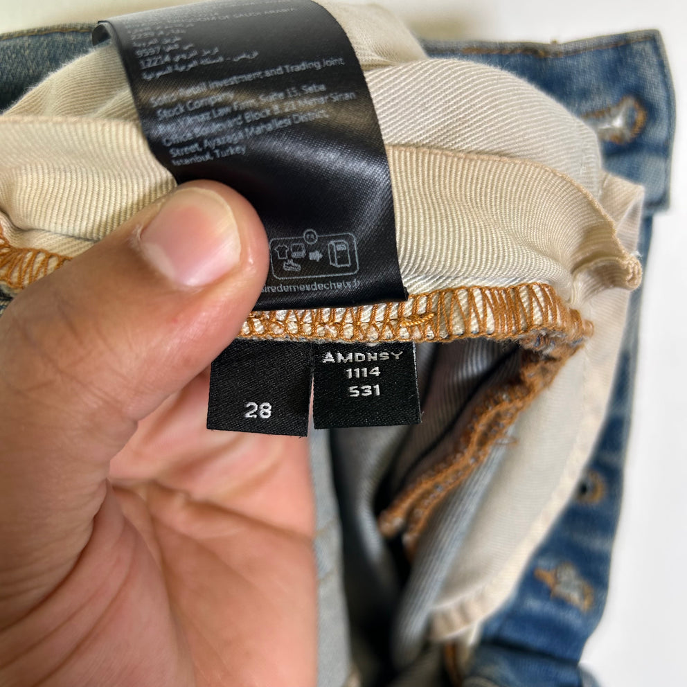 Amiri Lightwash Staggered Logo Denim Jeans