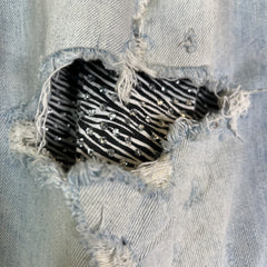 Amiri Lightwash Zebra Patch Distressed Jeans