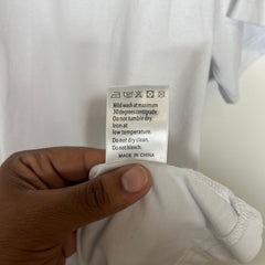 Who Decides War White Nameplate Embroidered Tee Size L