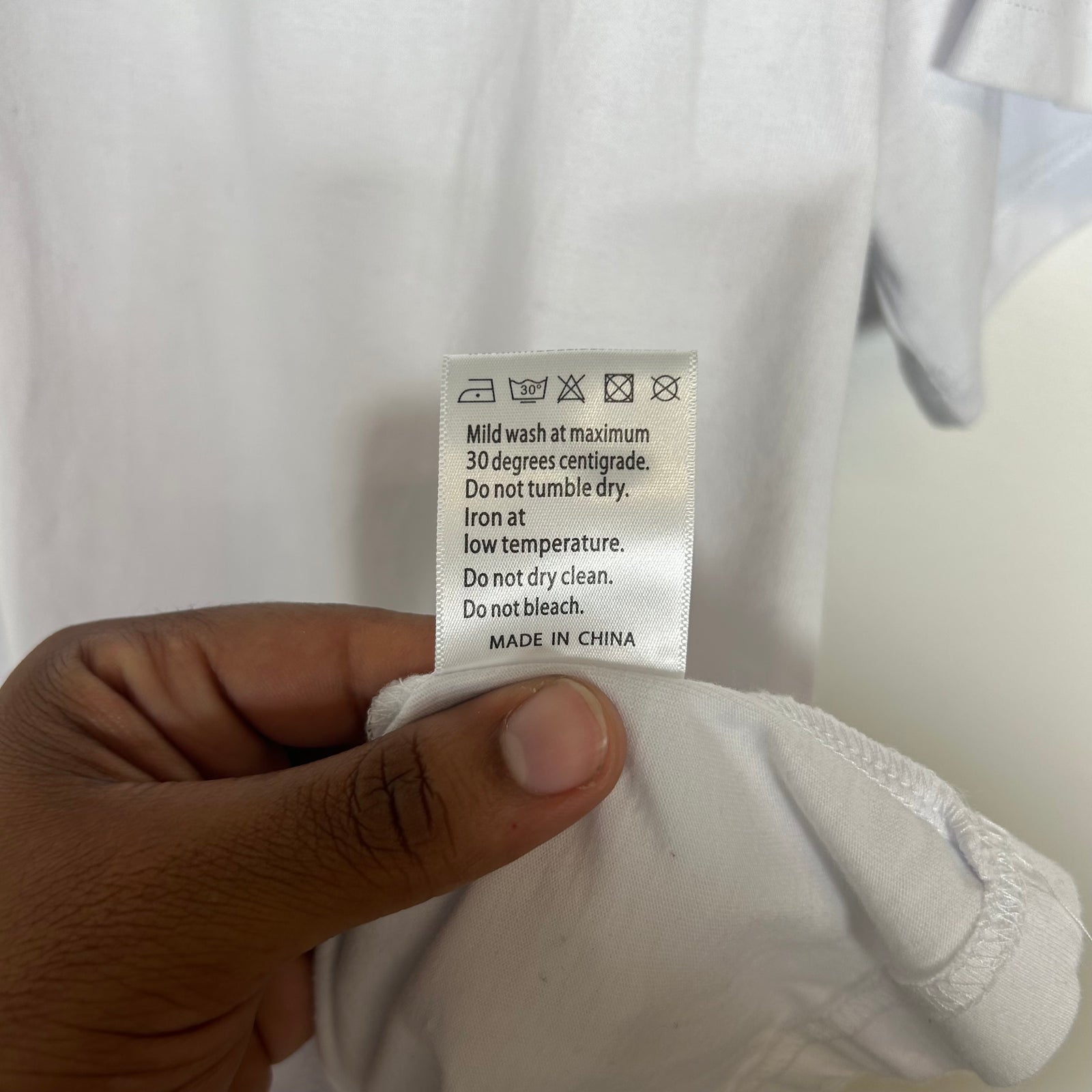 Who Decides War White Nameplate Embroidered Tee Size L