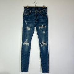 Amiri MX1 Indigo Black Patch Jeans