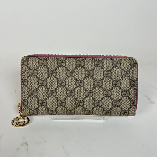 Gucci Pink GG Supreme Zip Around Wallet