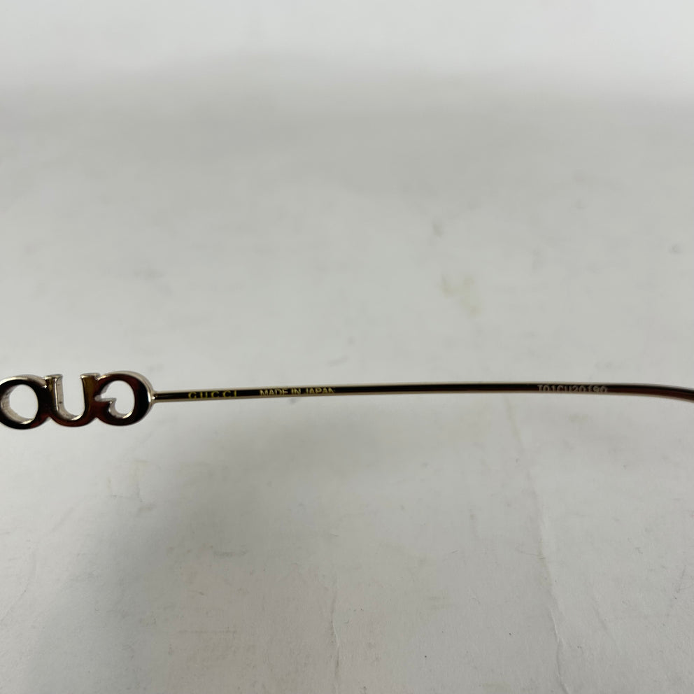 Gucci Spellout Logo Rimless Sunglasses