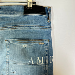 Amiri Lightwash Hibiscus Stencil Jeans