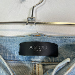 Amiri Lightwash Zebra Patch Distressed Jeans
