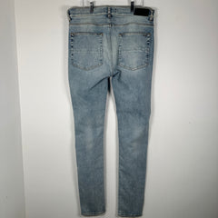 Amiri Light Wash Black Patch MX1 Jeans Size 36