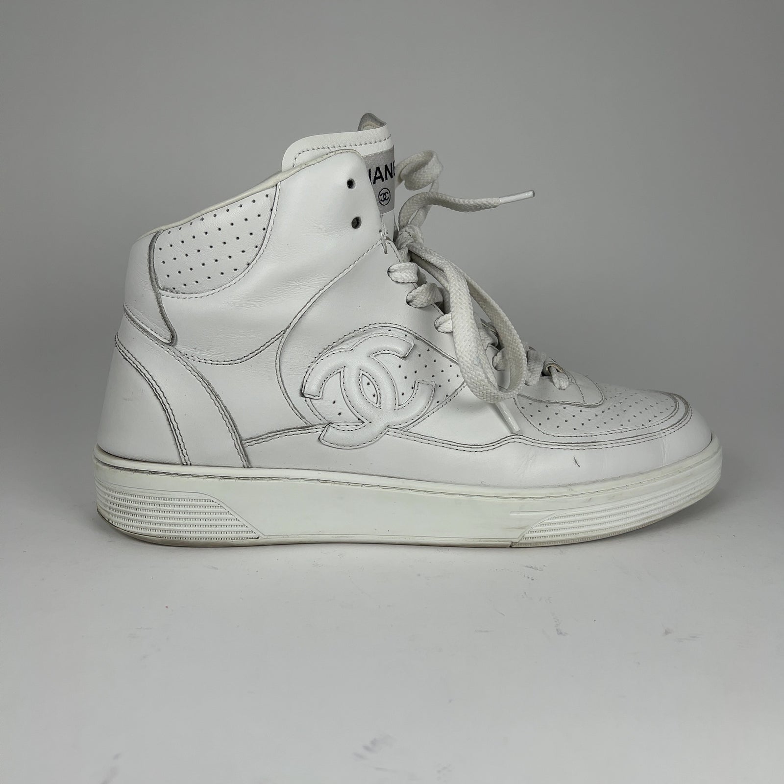 Chanel CC Triple White Hightop Sneakers