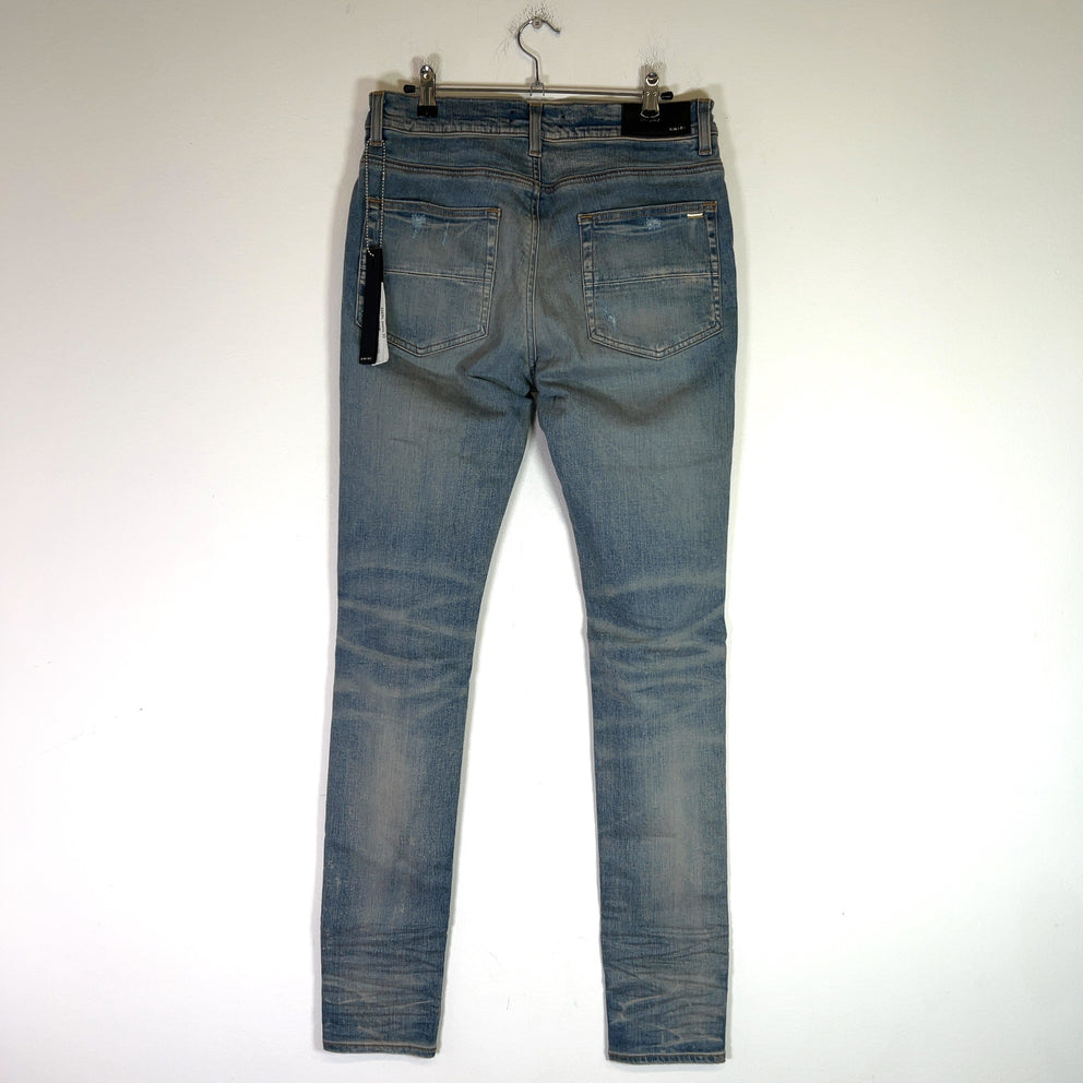Amiri Clay Indigo Applique Logo Denim Jeans