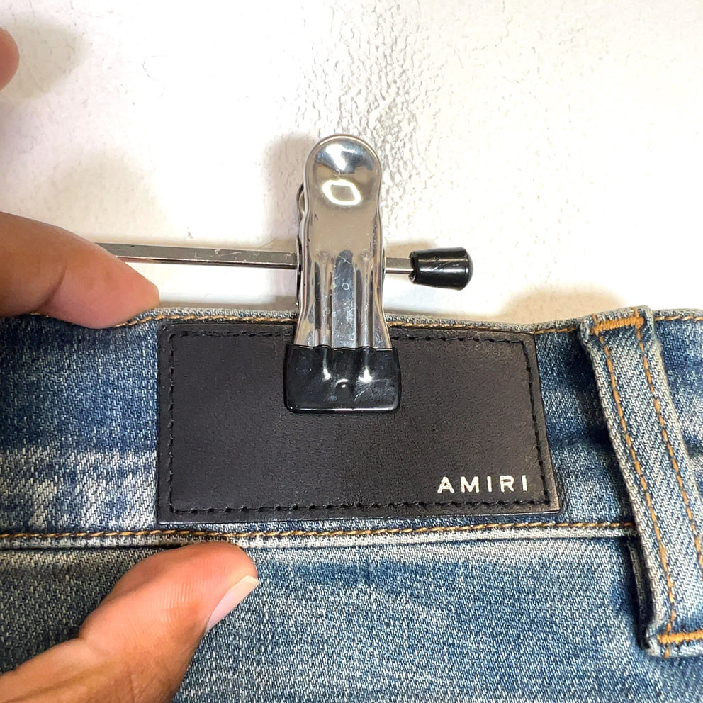 Amiri Clay Indigo Quilted Art Patch Denim Jeans