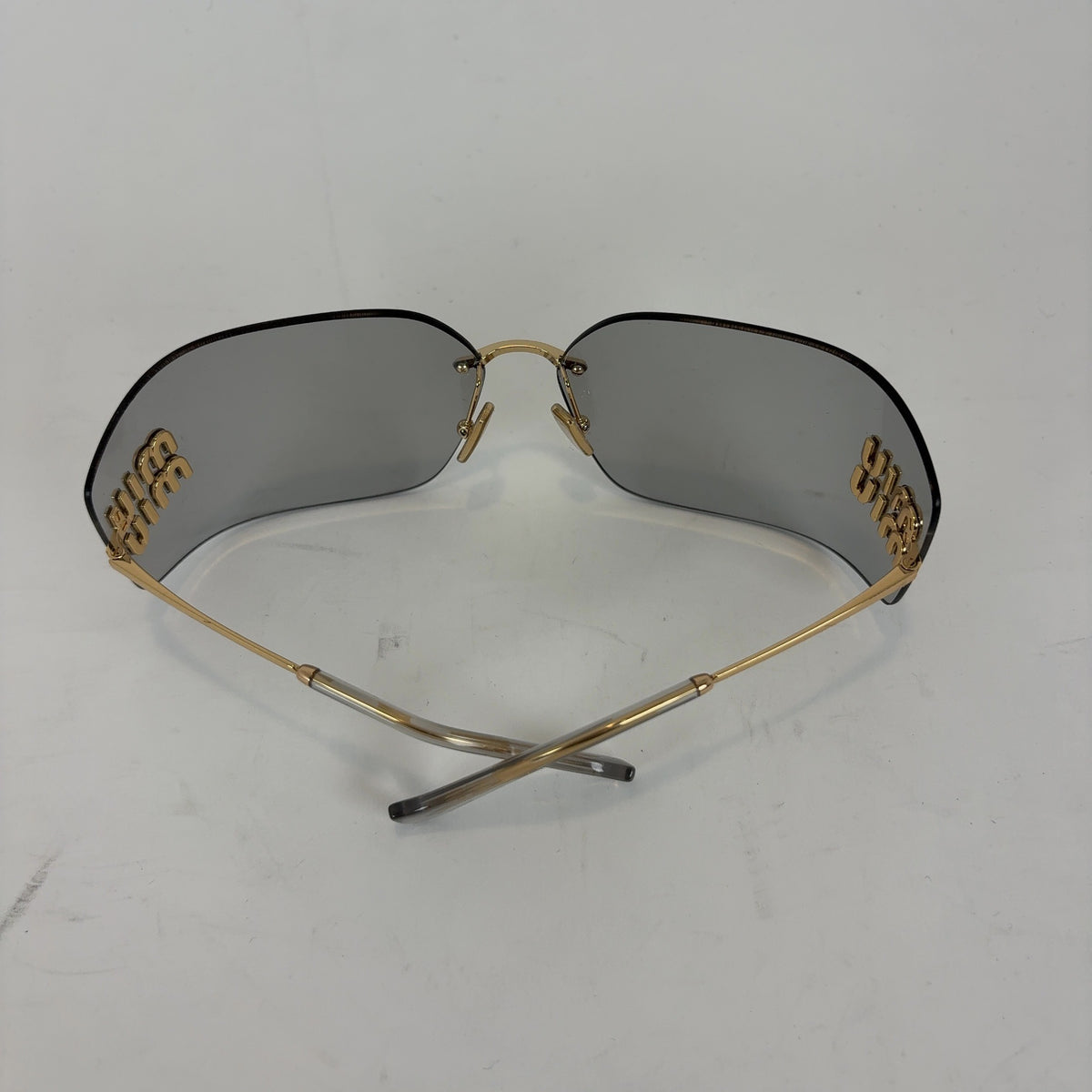 Miu Miu Wraparound Logo Sunglasses