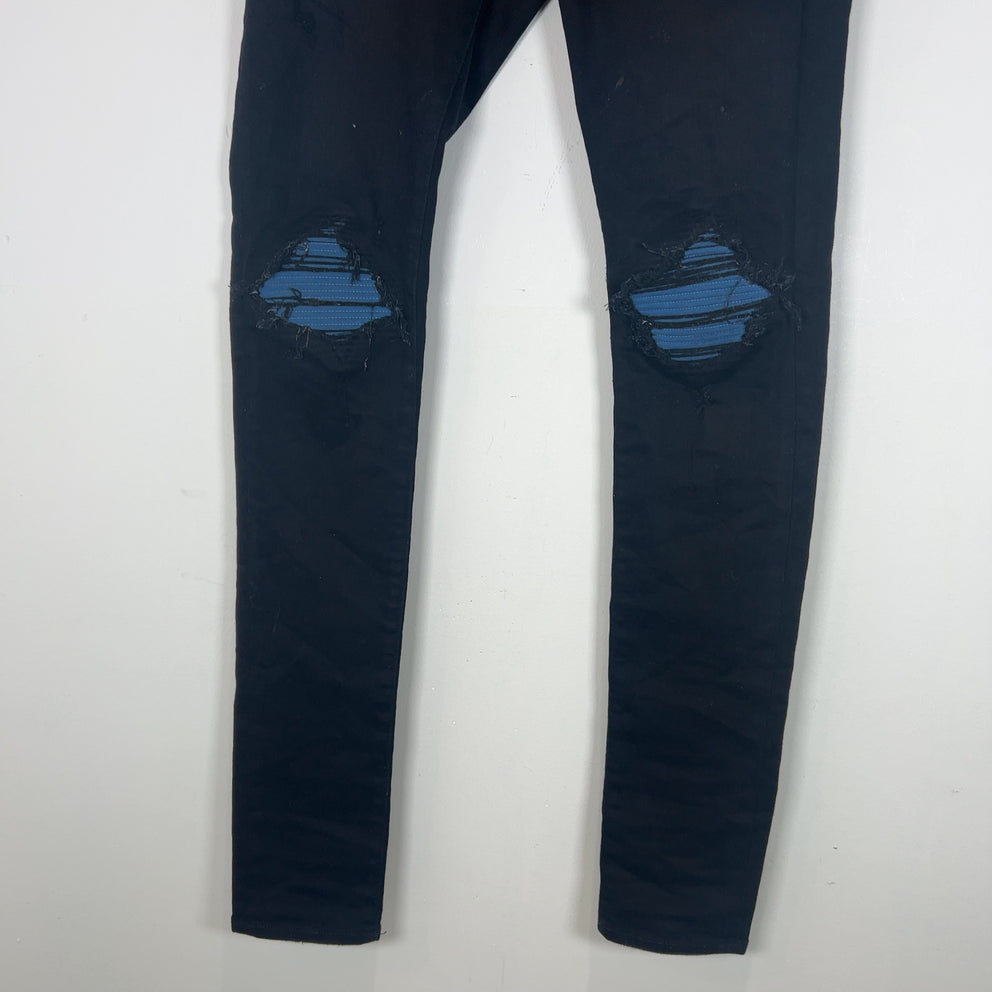 Amiri MX1 Cracked Denim Jeans
