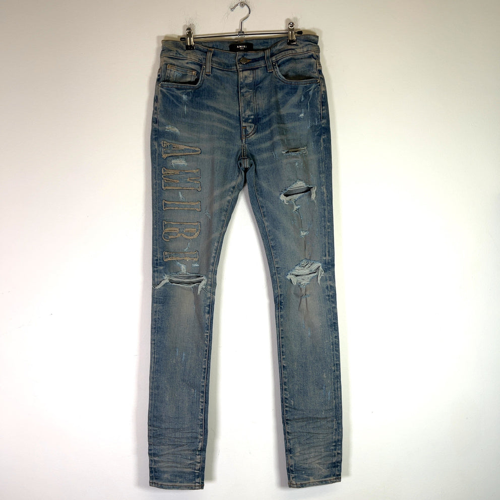 Amiri Clay Indigo Applique Logo Denim Jeans