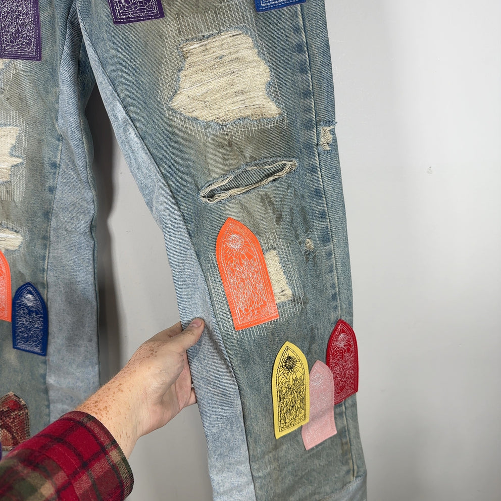Who Decides War Multi-Logo Leather Patch Jeans Size 32