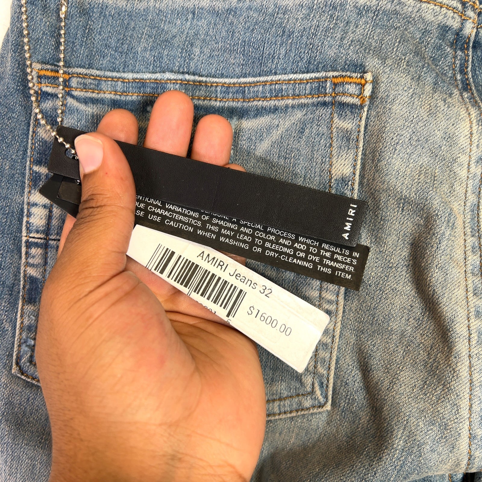 Amiri Clay Indigo Applique Logo Denim Jeans