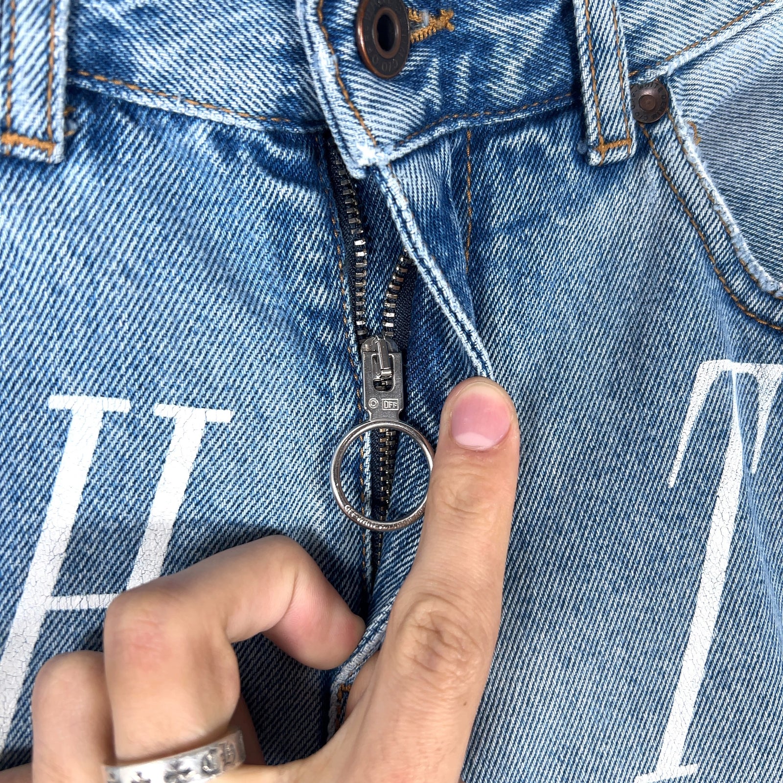 Off-White Striped Net Logo Jeans