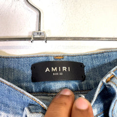 Amiri Light Indigo Hibiscus Art Patch Denim Jeans