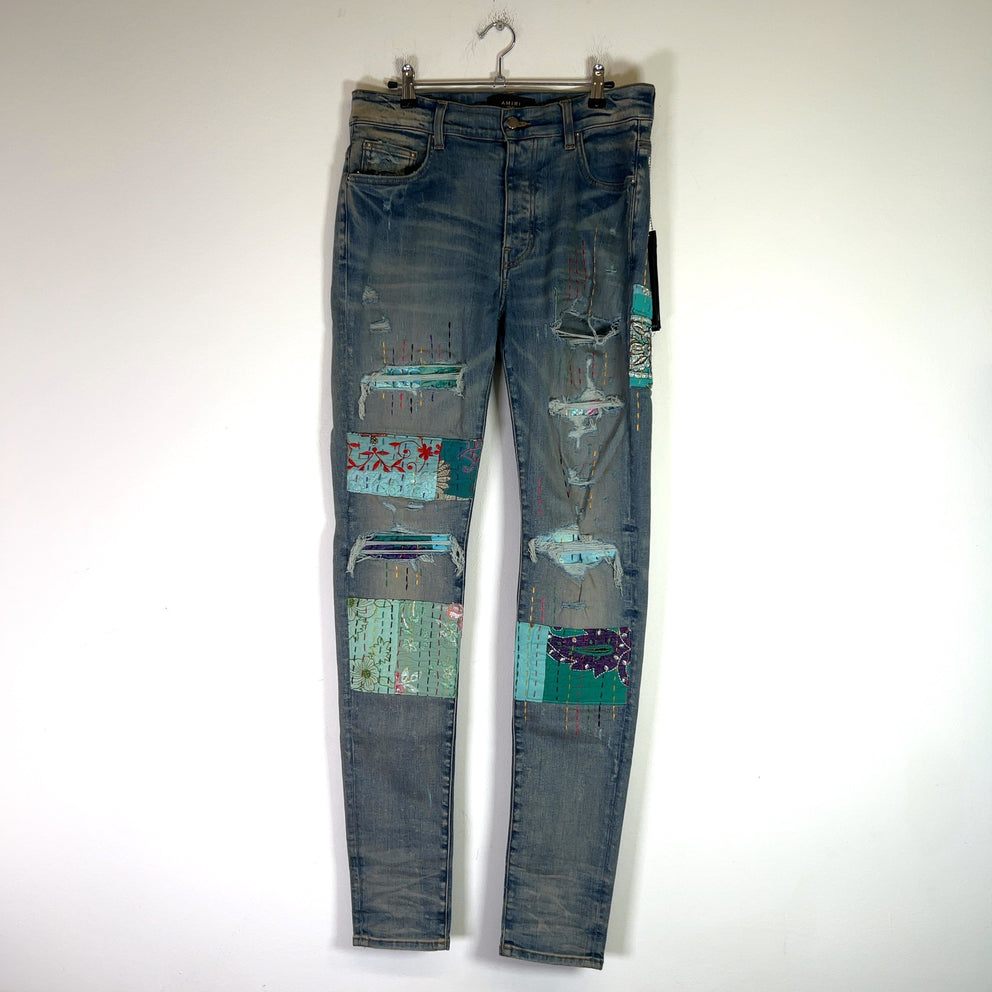 Amiri Clay Indigo Quilted Art Patch Denim Jeans